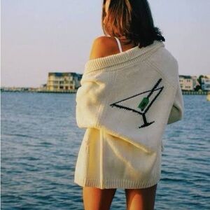 Pink Pineapple brand chunky “dirty martini” varsity sweater